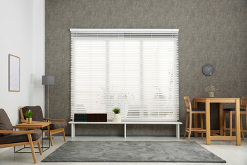 Modern room interior with stylish comfortable furniture