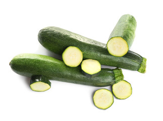 Fresh ripe green zucchinis isolated on white, top view