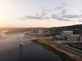 City with river Portland Oregon at sunset aerial view.
