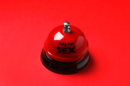 Sex bell on red background. Erotic role play