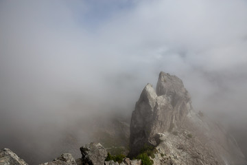Beautiful View of Canadian Mountain Landscape during a cloudy summer morning. Taken on Crown Mountain, North Vancouver, British Columbia, Canada.