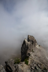 Beautiful View of Canadian Mountain Landscape during a cloudy summer morning. Taken on Crown Mountain, North Vancouver, British Columbia, Canada.