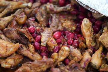 Open air kitchen at party. Cooking chicken meat on fire for Pilaf dish