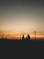Fototapeta premium couple backlight at sunset in Cartagena Colombia 