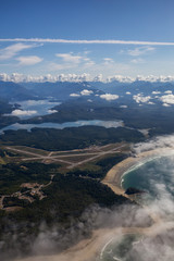 Aerial view of Long Beach Airport in Tofino during a vibrant summer morning. Located on the Pacific Coast in Vancouver Island, British Columbia, Canada.