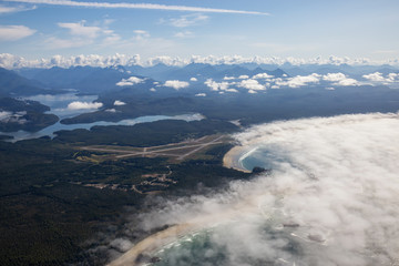 Aerial view of Long Beach Airport in Tofino during a vibrant summer morning. Located on the Pacific Coast in Vancouver Island, British Columbia, Canada.