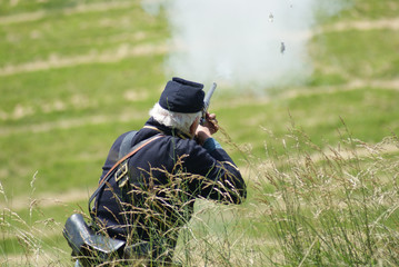 Civil War Soldier Firing a Rifle
