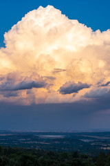 Storm clouds over holm oaks fields