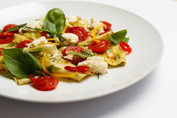 Italian pasta with a pesto sauce