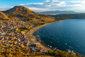 Fotobehang Cityscape of Copacabana city and the Titicaca Lake at sunset, Bolivia. © SL-Photography