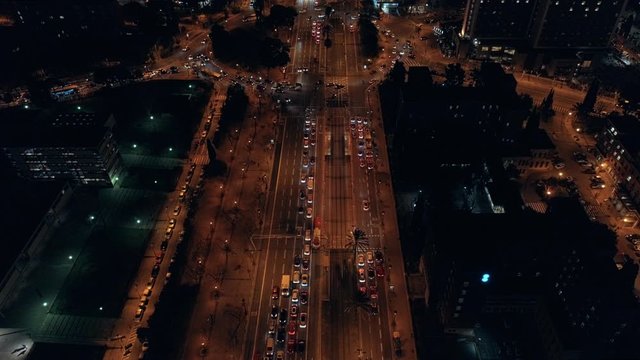 Night aerial shot of busy city traffic life