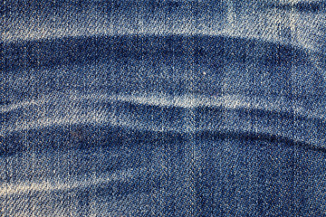 Jeans torn denim texture background.