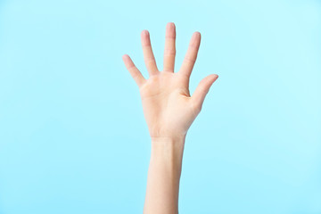 human hand showing number five