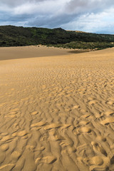 foot steps on the sand dunes in the desert
