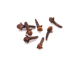 dry cloves on white background..