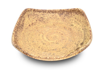 Brown plate isolated on white background.