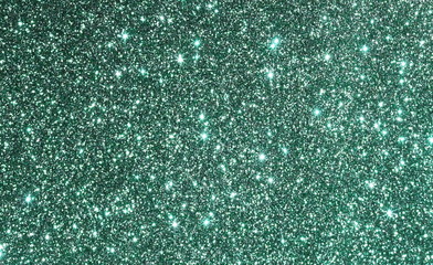 neo mint color sparkle glitter festive background,  texture. Xmas abstract backgrop with copy space.