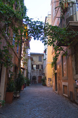 Fototapeta na wymiar Typical street in trastevere district, Rome, Lazio, Italy.