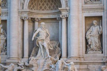 Fototapeta premium Trevi Fountain or Fontana di Trevi detail of the statue of the God of the Ocean, Rome, Italy