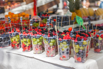 Berry cocktail in transparent glasses on a show-window