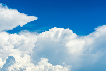 Obraz premium clouds abstract background. Cloudscape background. Blue sky and fluffy white clouds on sunny day. Nature weather. Bright day sky for happy day background.