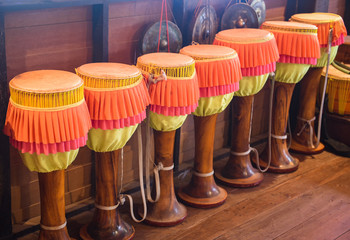 Long drums Thai music use as a device to create music Traditional - tall narrow drum made with animal skin