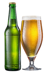 Glass of beer and green beer bottle with drops isolated on white background.