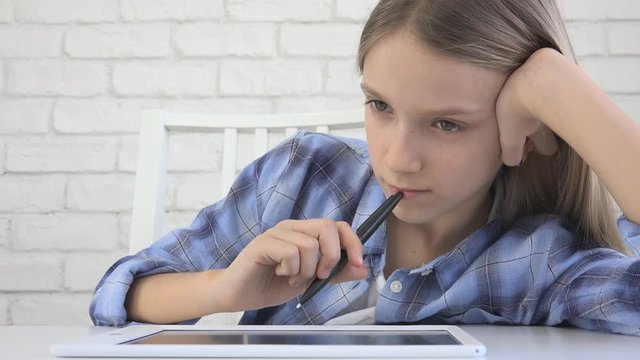 Child Studying on Tablet, Girl Writing in School Class, Learning Doing Homework
