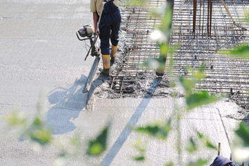 Naklejka premium Concrete pouring during commercial concreting floors of buildings in construction