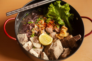 Noodle soup and pork with vegetables