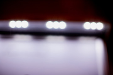 Abstract texture with blurred light line and black background