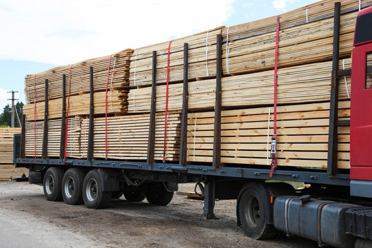 Truck with processed wood.