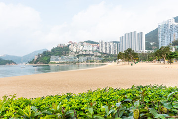 repulse bay beach of hong kong island with green bush