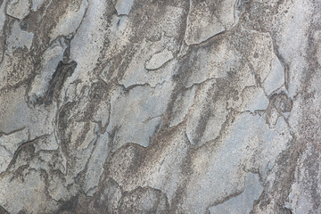 Natural colored rock crack texture closeup