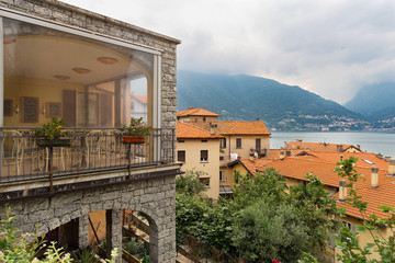 Fototapeta na wymiar View of restaurant and beautiful Lake Como Italy