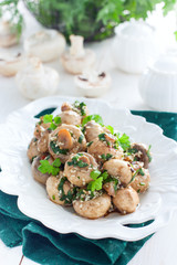 Marinated champignons in Korean with spices, herbs and sesame, selective focus