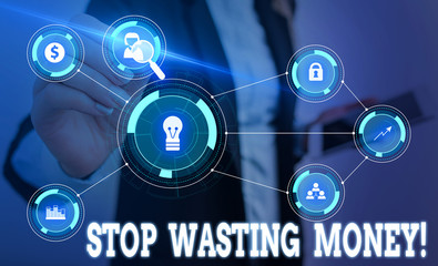 Writing note showing Stop Wasting Money. Business concept for advicing demonstrating or group to...