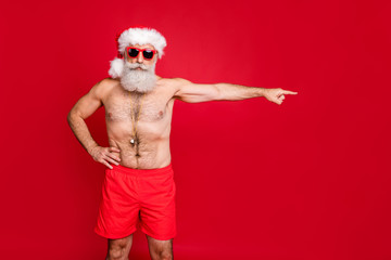 Portrait of nice attractive handsome content sporty virile strict bossy bearded gray-haired man sending you away way solution decision sea season isolated over bright vivid shine red background
