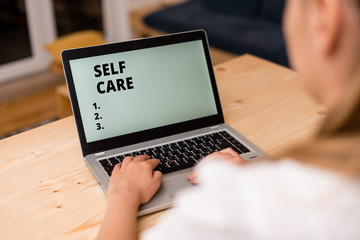 Conceptual hand writing showing Self Care. Concept meaning the practice of taking action to improve...