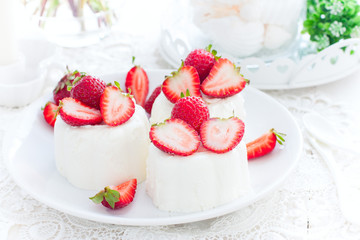 italian dessert panna cotta with fresh strawberries, horizontal
