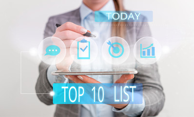 Handwriting text Top 10 List. Conceptual photo the ten most important or successful items in a particular list Female human wear formal work suit presenting presentation use smart device