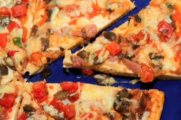Obraz na płótnie Canvas slice of hot pizza with melting cheese