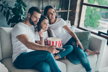 Portrait of nice attractive lovely charming cheerful cheery family wearing casual white t-shirts...