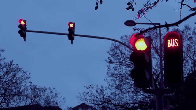 Traffic lights changing signal from red to green at Rossio Square in Lisbon, Portugal