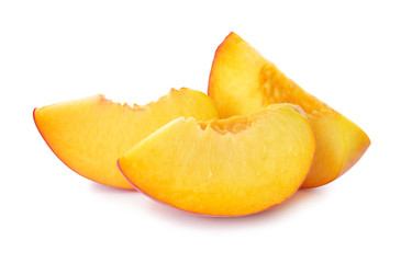 Ripe cut peach on white background