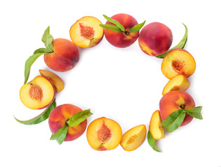 Frame made of ripe peaches on white background
