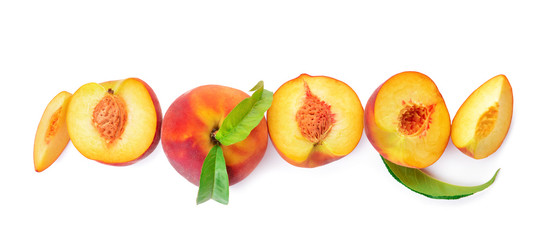 Ripe peaches on white background