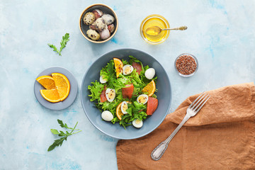 Composition with tasty fresh salad on color background