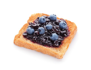 Tasty toasted bread with berry jam on white background