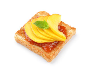 Tasty toasted bread with fruit jam on white background